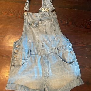 Denim overall shorts size medium. We the free